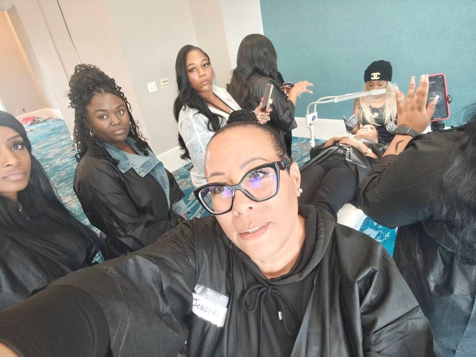 Pink Beauty Brow Lab Academy students and instructor during hands-on training